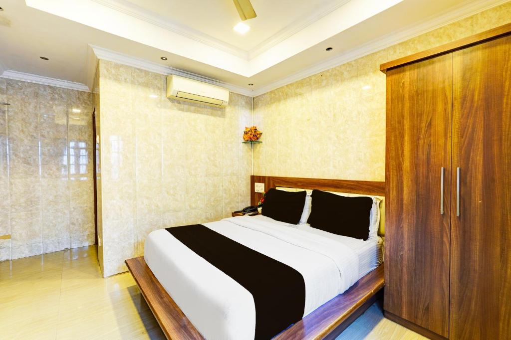 Postel nebo postele na pokoji v ubytování Super Hotel O Triplicane formerly Park Royal