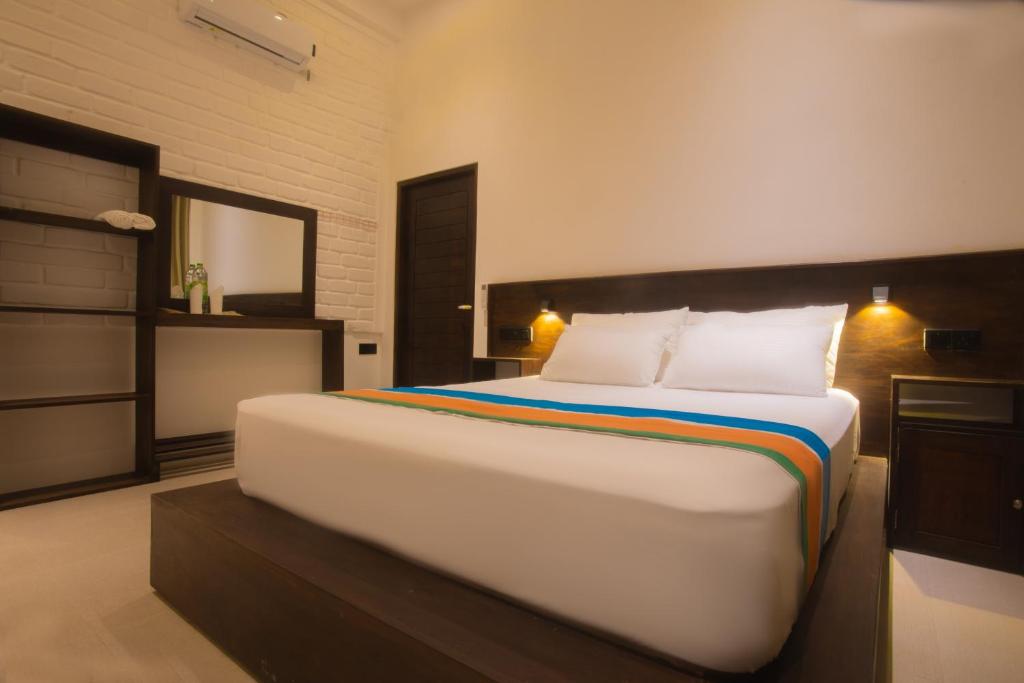 Postel nebo postele na pokoji v ubytování Luminozo Beach Hotel