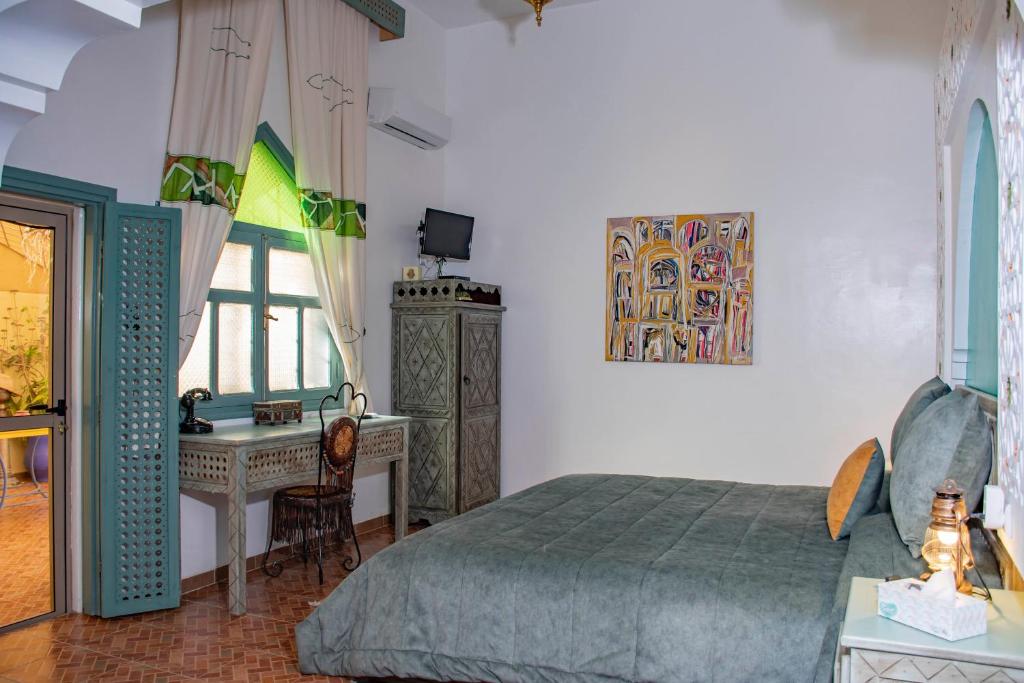 Kuchyň nebo kuchyňský kout v ubytování Le Petit Riad Maison d'hôtes