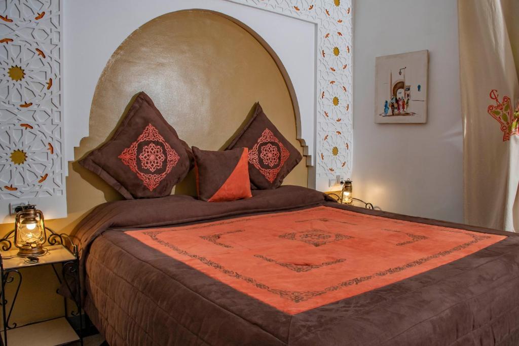 Postel nebo postele na pokoji v ubytování Le Petit Riad Maison d'hôtes