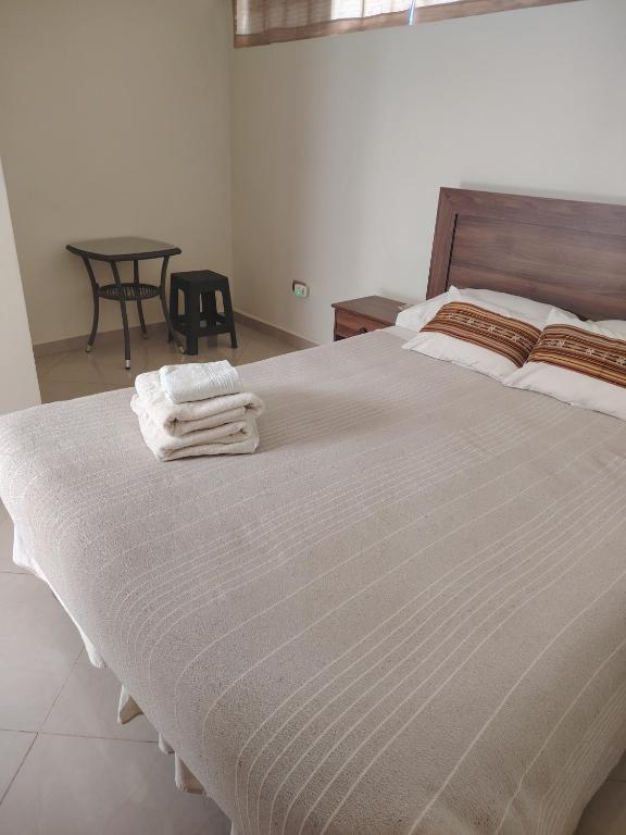 Voodi või voodid majutusasutuse Hostal Anpaymi Atacama toas