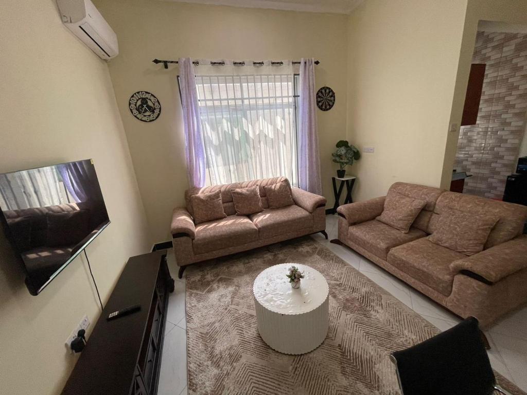 Χώρος καθιστικού στο Mimykibz Homestays