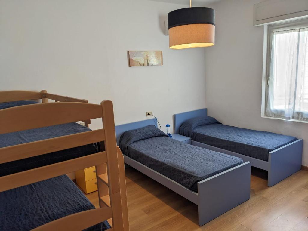Postel nebo postele na pokoji v ubytování Villa Serena