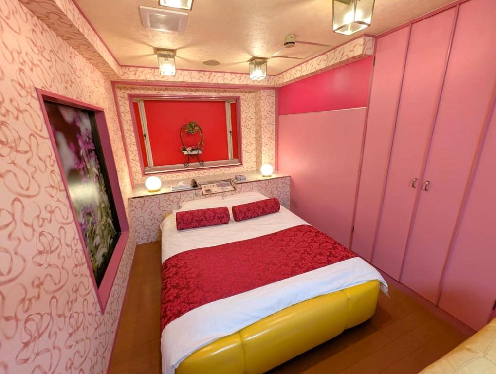 Postel nebo postele na pokoji v ubytování Hotel Sha A Nai Yan (Adult Only)