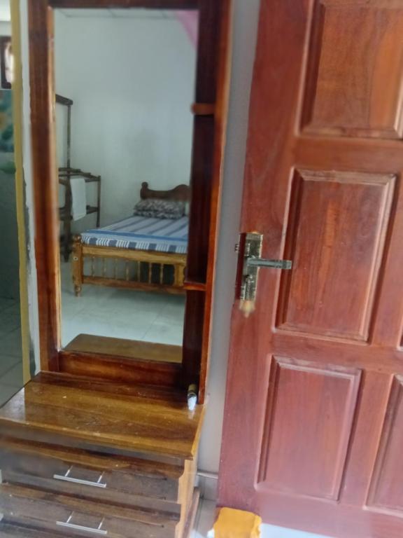 Postel nebo postele na pokoji v ubytování Sulashika Beach House