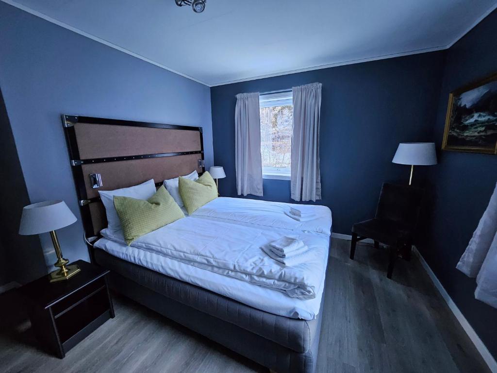 Postel nebo postele na pokoji v ubytování Fossen Accommodation