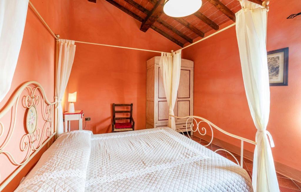 Postel nebo postele na pokoji v ubytování Podere La Casina