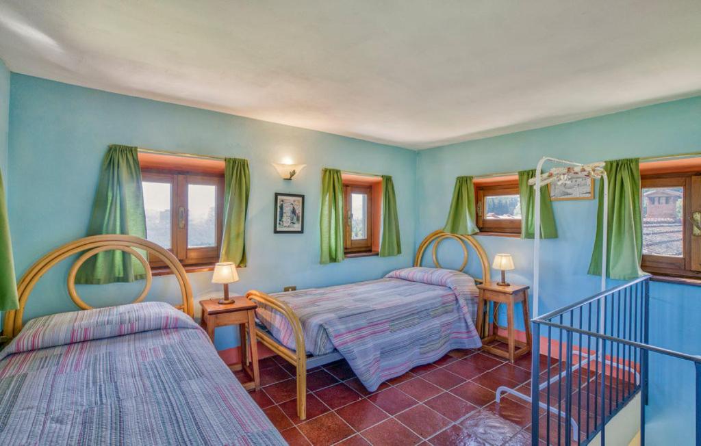 Postel nebo postele na pokoji v ubytování Podere La Casina