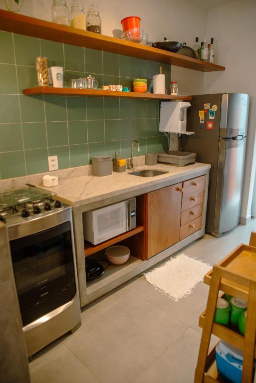Kuchyň nebo kuchyňský kout v ubytování Chalé de Chica - Vila das Andorinhas