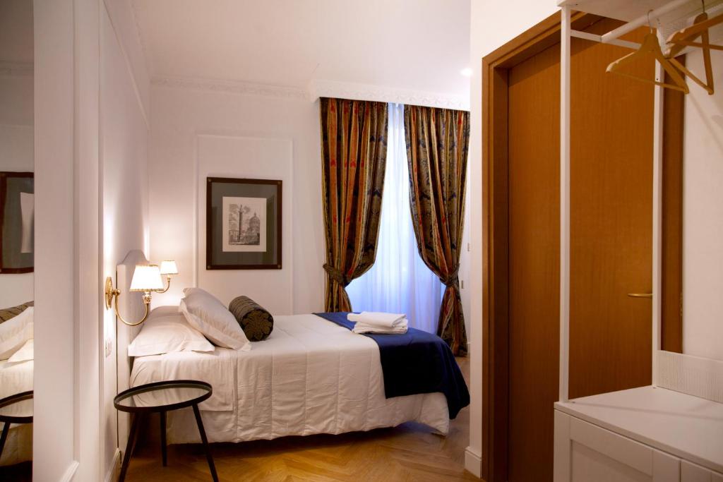 Postel nebo postele na pokoji v ubytování Hotel Silva
