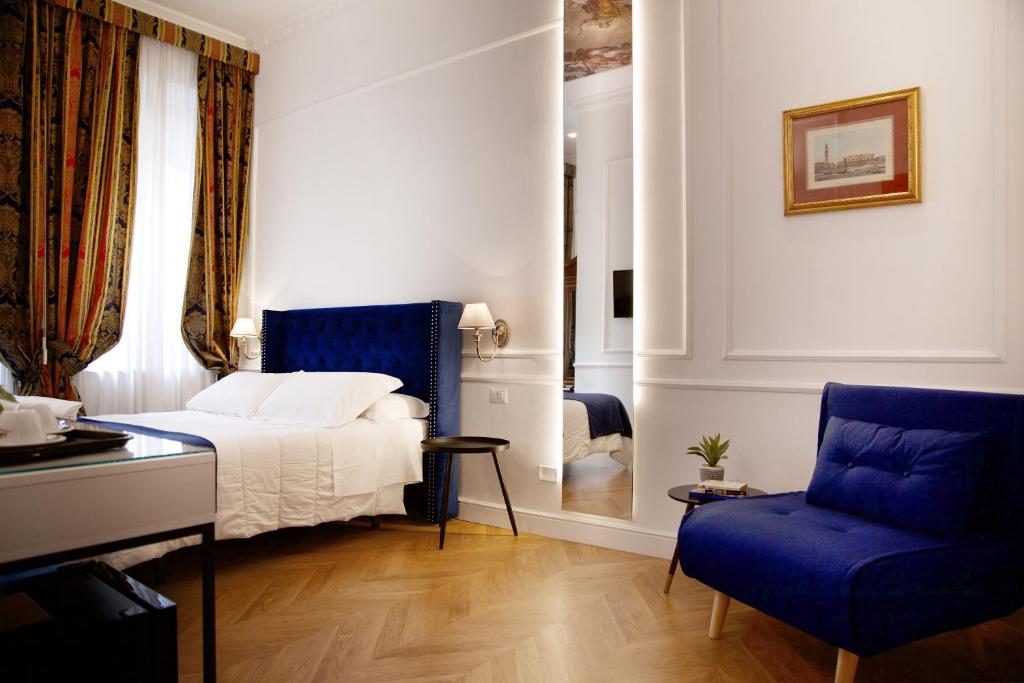 Postel nebo postele na pokoji v ubytování Hotel Silva