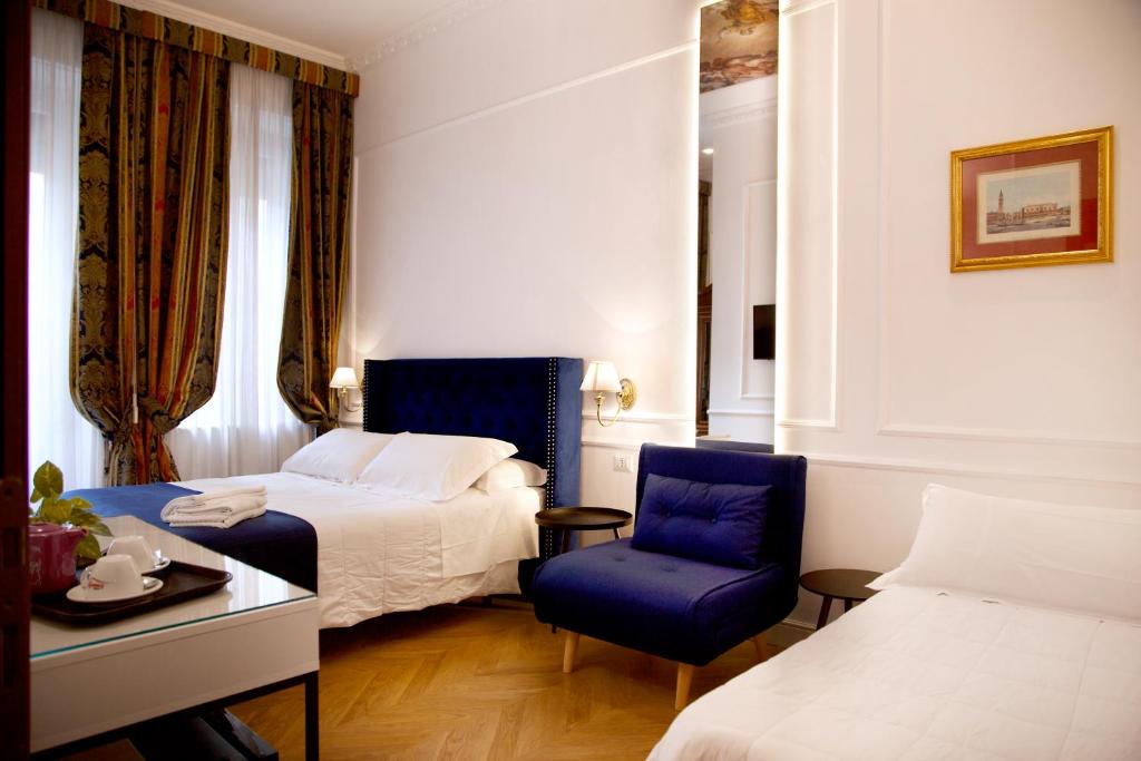 Postel nebo postele na pokoji v ubytování Hotel Silva
