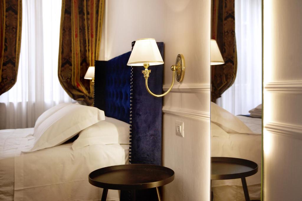 Postel nebo postele na pokoji v ubytování Hotel Silva