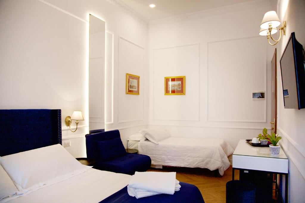 Postel nebo postele na pokoji v ubytování Hotel Silva