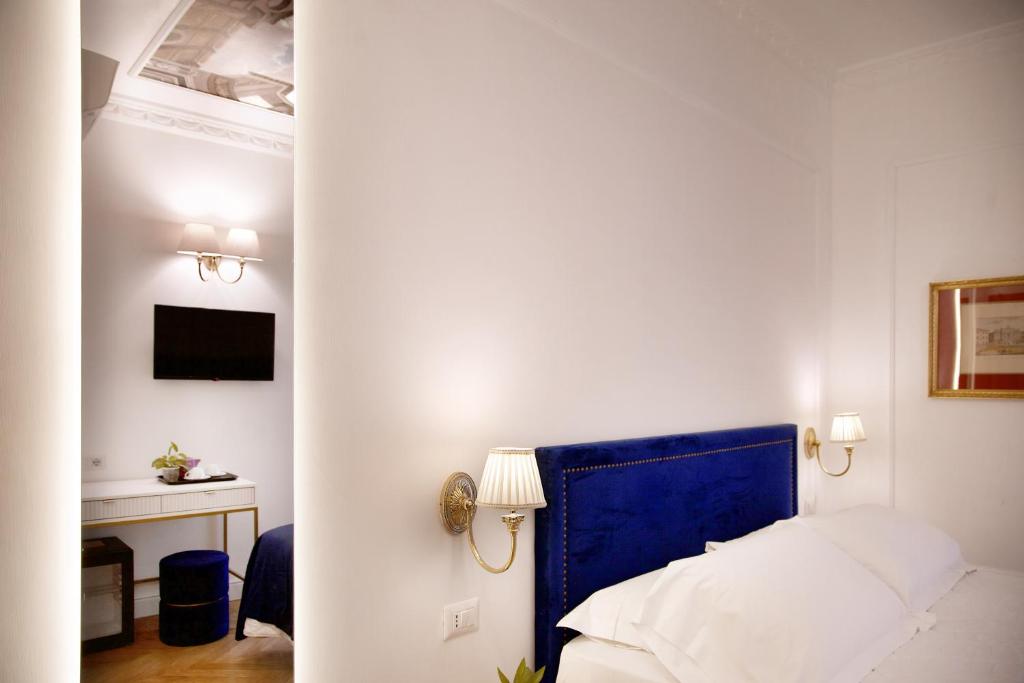 Postel nebo postele na pokoji v ubytování Hotel Silva
