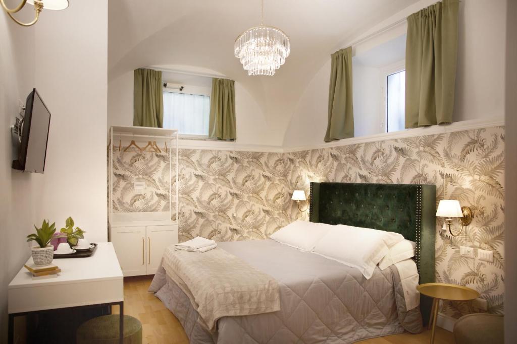 Postel nebo postele na pokoji v ubytování Hotel Silva