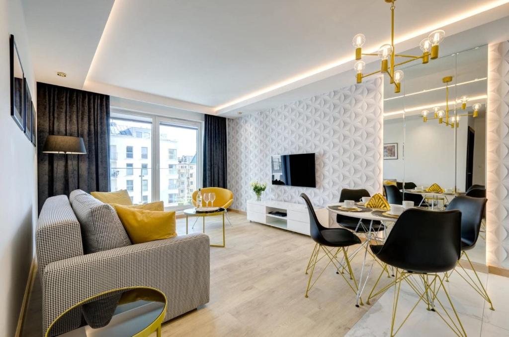 TV a/nebo společenská místnost v ubytování Apartamenty Angielska Grobla Q4Apartments