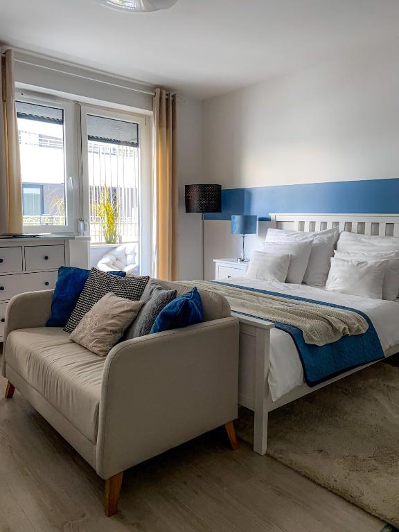 Postel nebo postele na pokoji v ubytování Leonardo50 Apartment