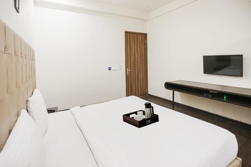 TV a/nebo společenská místnost v ubytování Townhouse The AMV Hotel