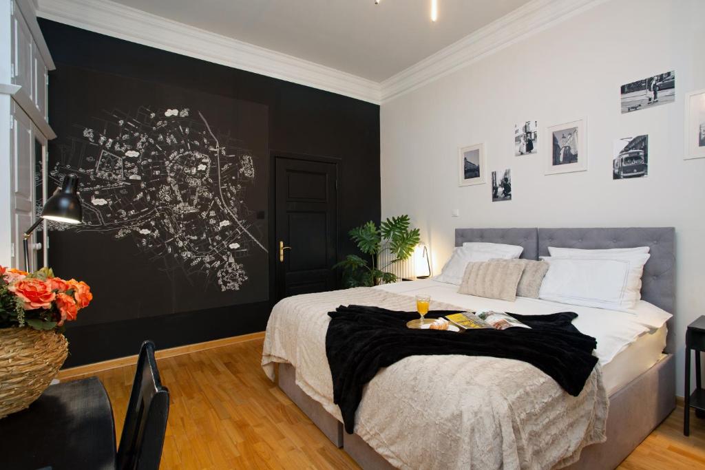 Posteľ alebo postele v izbe v ubytovaní Otium Old Town Boutique