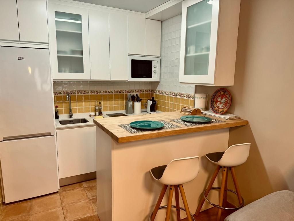 Η κουζίνα ή μικρή κουζίνα στο Acogedor Apartamento en Camaleño