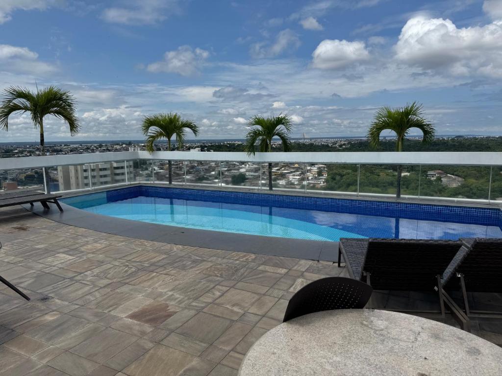 Bazén v ubytování Manaus Hotéis Millenium - suíte espelhada nebo v jeho okolí