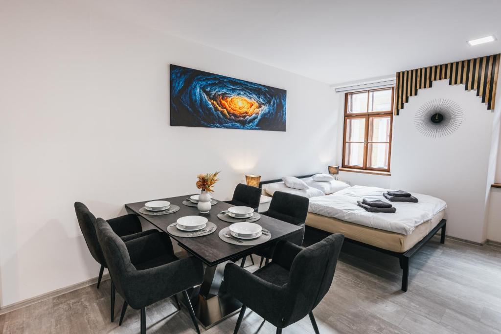 Ένα ή περισσότερα κρεβάτια σε δωμάτιο στο Apartmány U Doskočilů