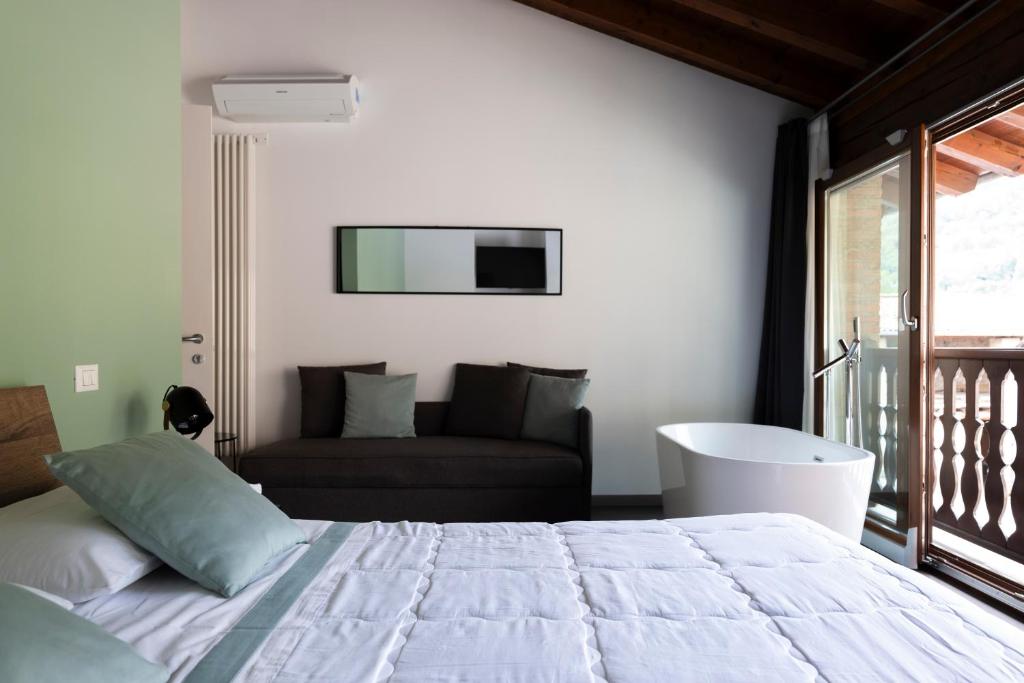 Postel nebo postele na pokoji v ubytování La terrazza sulle vigne B&B