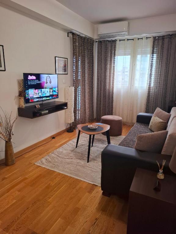 TV a/nebo společenská místnost v ubytování Apartman Miss T