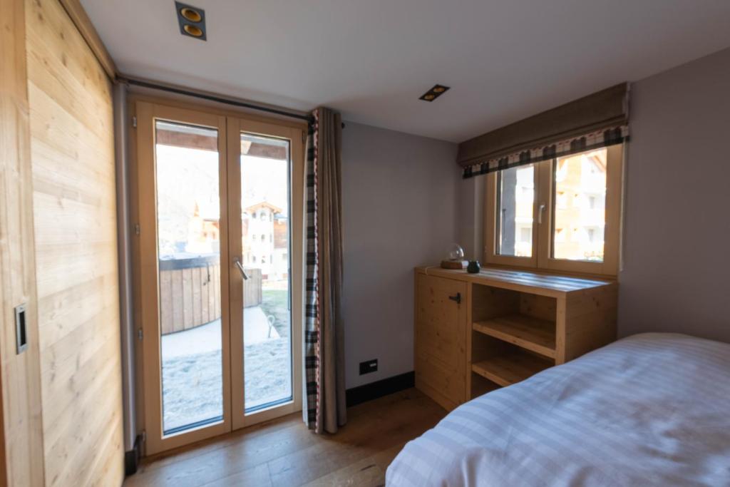 Postel nebo postele na pokoji v ubytování Chalet Myriam