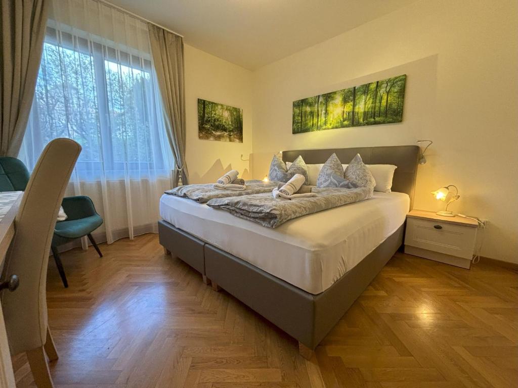 Postel nebo postele na pokoji v ubytování MARTINIHOF - Appartements mit Frühstück