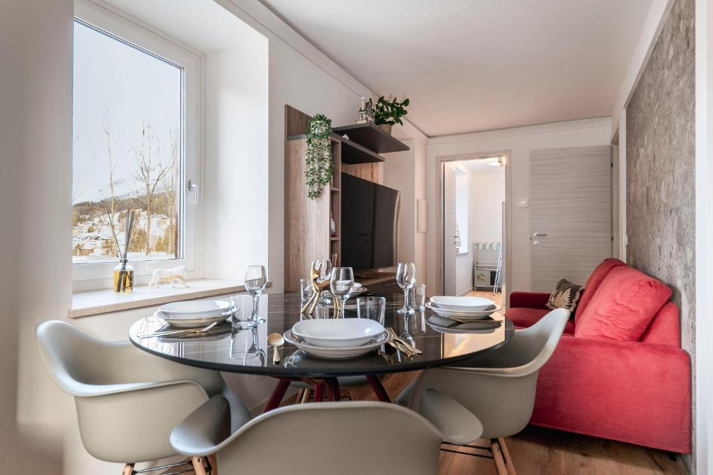 Χώρος καθιστικού στο Dolomite Elegance - Chic Flat in San Vito di Cadore
