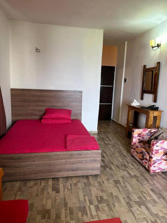 Postel nebo postele na pokoji v ubytování Byblos inn