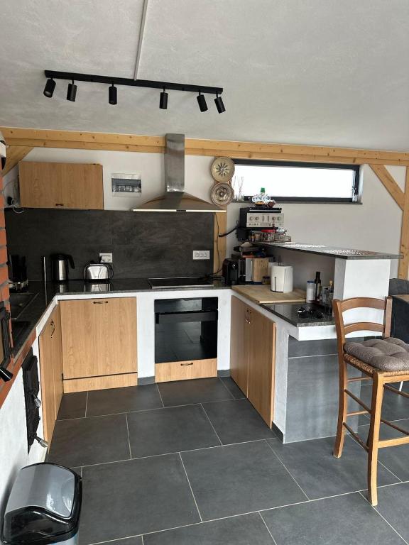 Kuchyň nebo kuchyňský kout v ubytování HOME Resort RS
