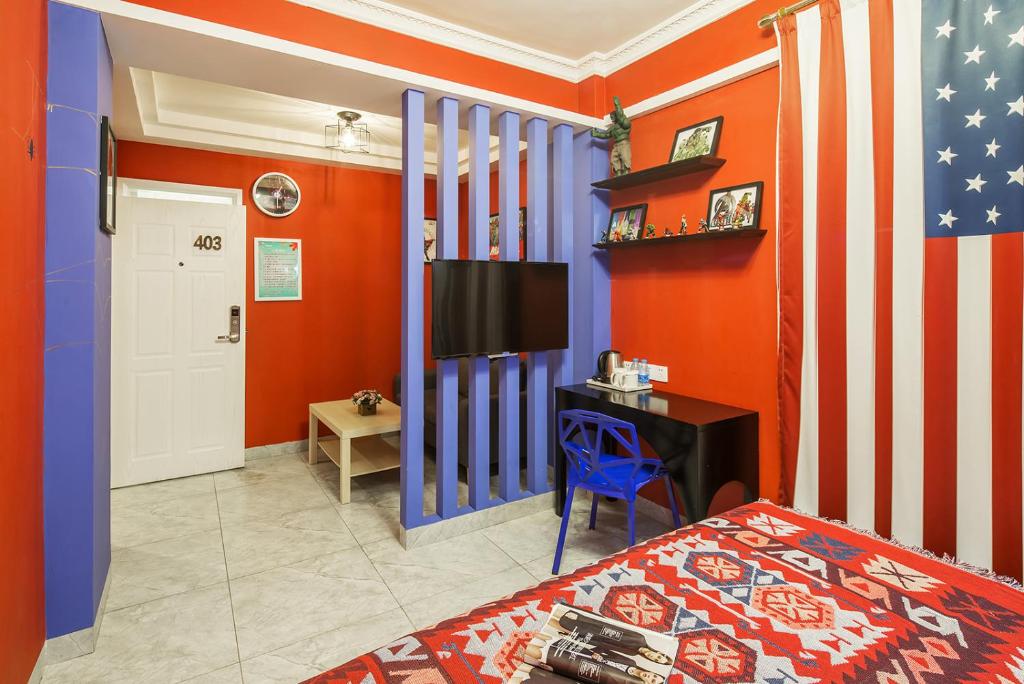 TV a/nebo společenská místnost v ubytování Summer inn Sanya三亚夏末花开酒店
