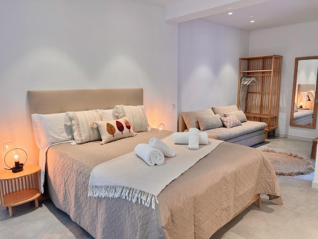Ένα ή περισσότερα κρεβάτια σε δωμάτιο στο BiS Suites Ruzafa