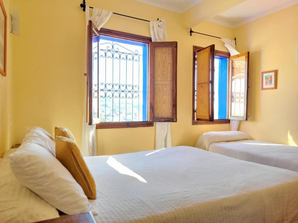 Voodi või voodid majutusasutuse Hotel Gernika toas