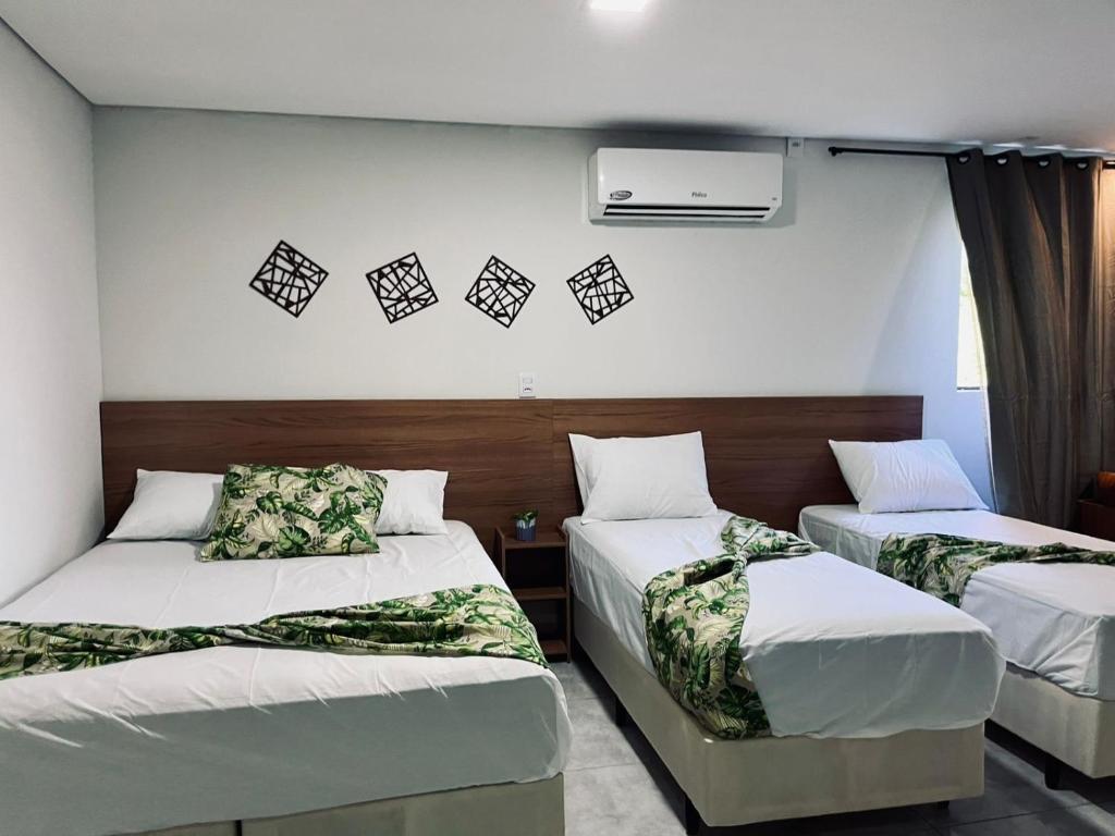Katil atau katil-katil dalam bilik di Hotel Coutinho