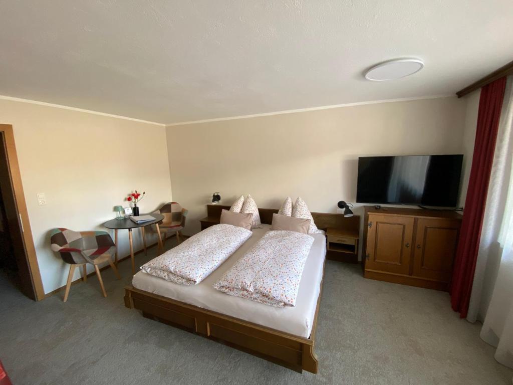 Posteľ alebo postele v izbe v ubytovaní Alpinum Hostel