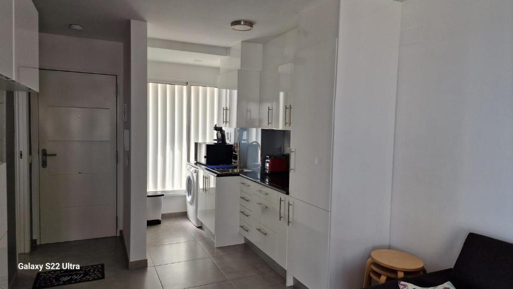 Televízia a/alebo spoločenská miestnosť v ubytovaní Edificio Hernando II