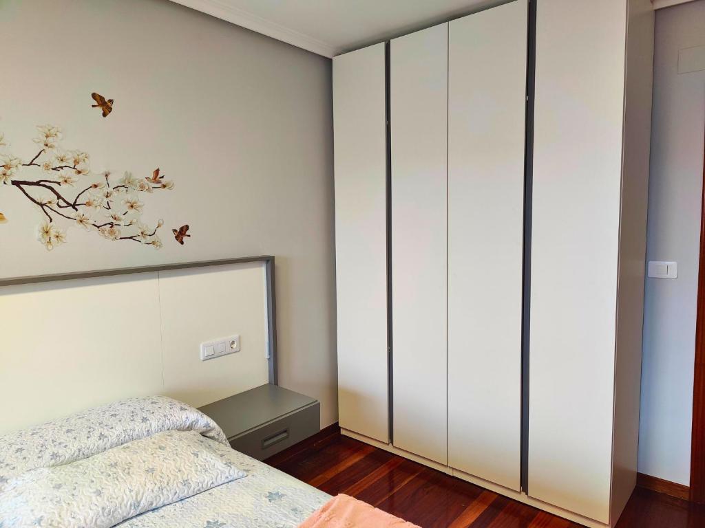 Postel nebo postele na pokoji v ubytování Casa-Nova Centro