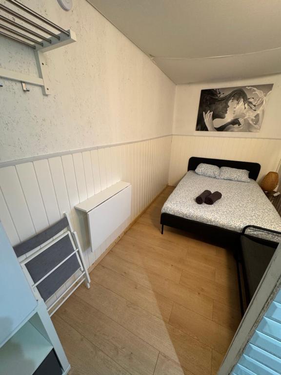 Postel nebo postele na pokoji v ubytování Chambre 1 avec salle de bain privative