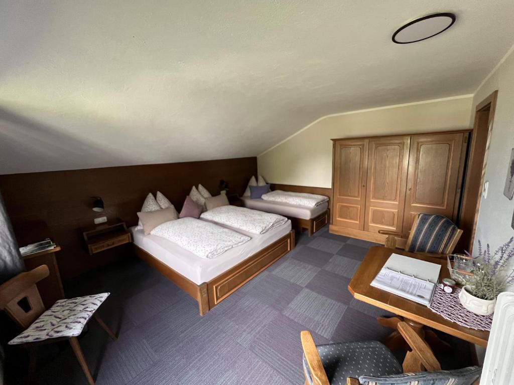 Posteľ alebo postele v izbe v ubytovaní Alpinum Hostel