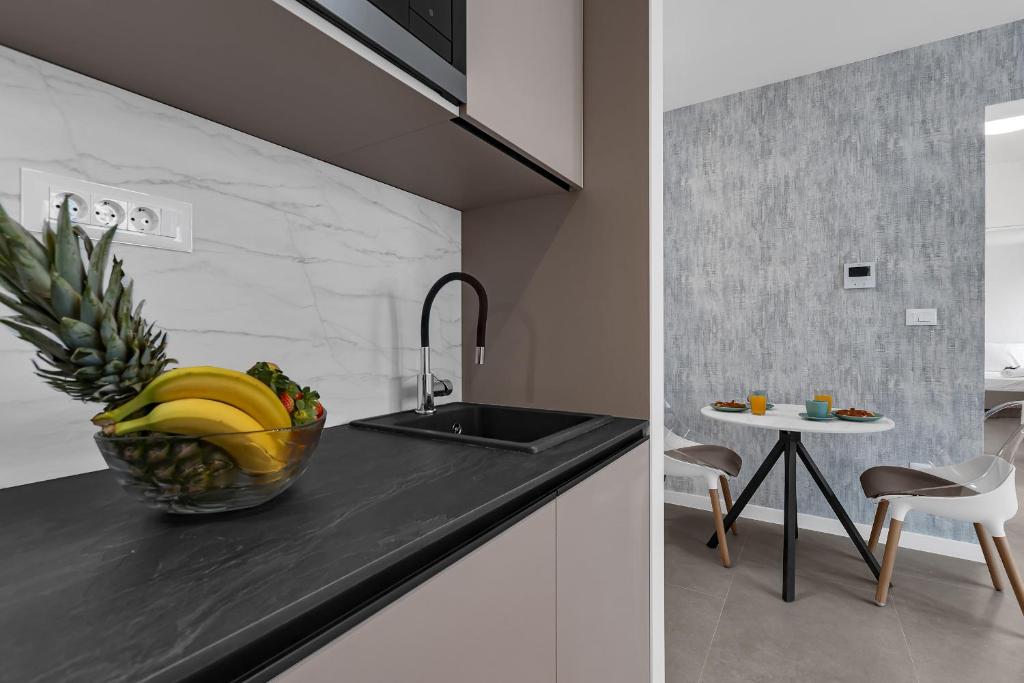 Kuchyň nebo kuchyňský kout v ubytování Perla Apartments Baska Voda