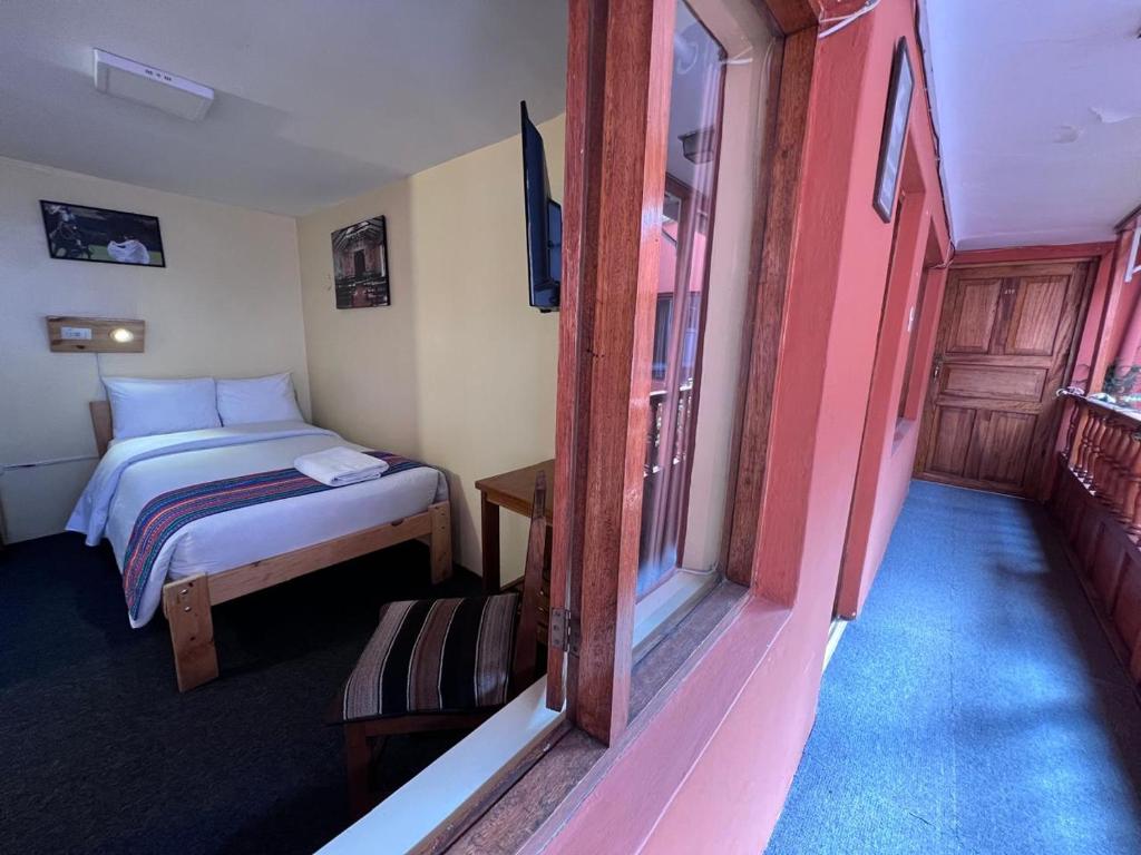 Postel nebo postele na pokoji v ubytování Eco Inn