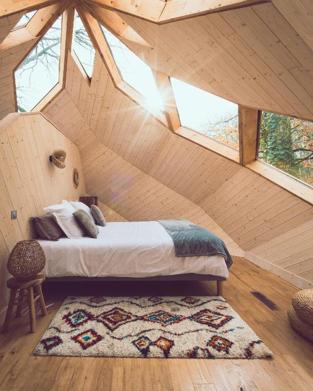 Postel nebo postele na pokoji v ubytování Nid'en'Ô cabanes et spa Lot et Dordogne