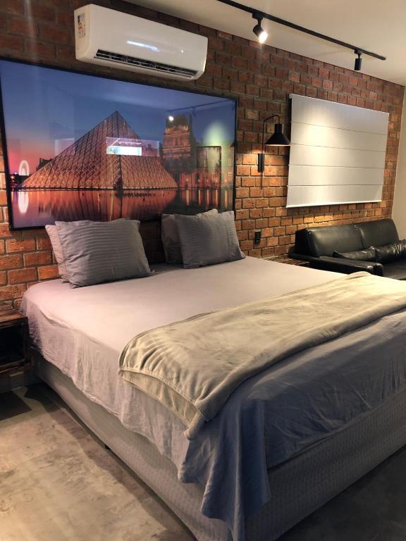 Postel nebo postele na pokoji v ubytování W4 Hotel
