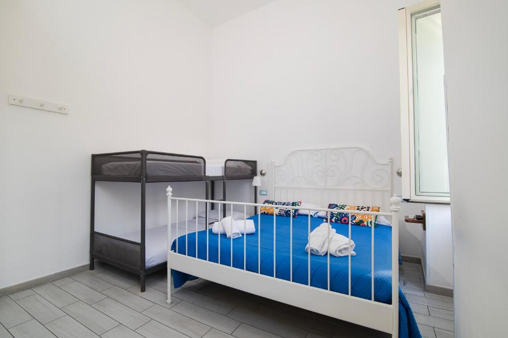 Posteľ alebo postele v izbe v ubytovaní Domus Linda B&B