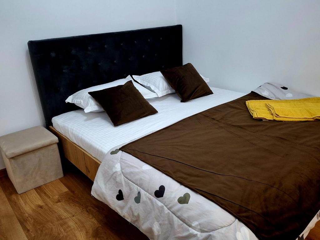 Postel nebo postele na pokoji v ubytování Merry Home