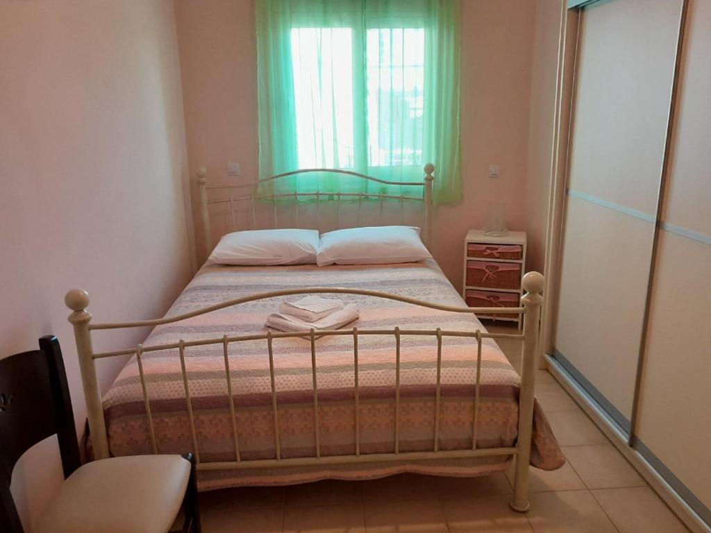 Posteľ alebo postele v izbe v ubytovaní Omorfi Poli 120 sqm Apartment